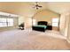 Bright and spacious main bedroom with carpet flooring, a ceiling fan, and plenty of natural light at 2269 Reddy Farm Ln, Grayson, GA 30017