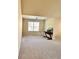 Room featuring carpeted floors, a window and a desk with chair at 2269 Reddy Farm Ln, Grayson, GA 30017