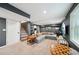 Spacious finished basement with carpet, gray walls, and comfortable seating area at 2324 Bry Mar Ne Dr, Atlanta, GA 30345