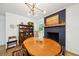 Charming dining area with a painted brick fireplace and stylish decor at 2324 Bry Mar Ne Dr, Atlanta, GA 30345