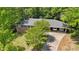 Charming brick home features a well-maintained yard and attached carport with parking for two vehicles at 2324 Bry Mar Ne Dr, Atlanta, GA 30345