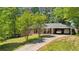 Charming single-story brick home featuring a covered carport and a well-manicured front yard at 2324 Bry Mar Ne Dr, Atlanta, GA 30345