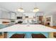 Modern kitchen features stainless steel appliances, quartz countertops, and updated cabinets at 2324 Bry Mar Ne Dr, Atlanta, GA 30345