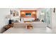 Inviting living room showcasing modern furniture and a decorative focal wall with shelves at 2324 Bry Mar Ne Dr, Atlanta, GA 30345