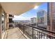 City view from condo balcony with iron railings, overlooking urban landscape with high-rise buildings at 620 Peachtree Ne St # 1412, Atlanta, GA 30308