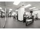 Modern gym featuring various weight machines, cardio equipment, and mirrored walls at 620 Peachtree Ne St # 1412, Atlanta, GA 30308