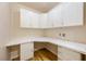 Home office with built-in cabinets, drawers, and a spacious desk area at 620 Peachtree Ne St # 1412, Atlanta, GA 30308