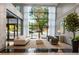 Stunning lobby with a soaring ceiling, modern furnishings, and abundant natural light at 620 Peachtree Ne St # 1412, Atlanta, GA 30308