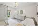 Luxurious bathroom with double vanity, freestanding tub, and a glass-enclosed shower at 8925 Huntcliff Lake Ct, Atlanta, GA 30350