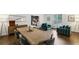 Elegant dining room featuring hardwood floors and stylish seating arrangements at 8925 Huntcliff Lake Ct, Atlanta, GA 30350