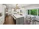 Bright kitchen with a large island, stainless steel appliances, and eat in breakfast nook at 8925 Huntcliff Lake Ct, Atlanta, GA 30350