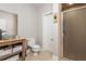 Bathroom featuring tile floors, modern fixtures, and a step-in shower at 107 Estates At The Lake Dr, Canton, GA 30114