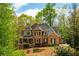 Beautiful brick home with mature trees and manicured landscaping providing excellent curb appeal at 107 Estates At The Lake Dr, Canton, GA 30114
