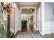 Inviting foyer with hardwood floors, neutral paint, and a decorative glass door at 107 Estates At The Lake Dr, Canton, GA 30114
