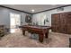 Game room featuring a pool table, dart board, and hardwood doors at 107 Estates At The Lake Dr, Canton, GA 30114