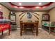 Game room with a dining area and vintage pinball machines at 107 Estates At The Lake Dr, Canton, GA 30114