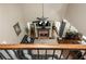 Open living room boasts hardwood floors, brick fireplace, and expansive two-story layout at 107 Estates At The Lake Dr, Canton, GA 30114