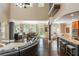 Open-concept living area features high ceilings, kitchen, dining, and seating area at 107 Estates At The Lake Dr, Canton, GA 30114