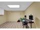 Finished basement space with tile floors, beige walls, and drumset at 2433 Idlewood Way, Snellville, GA 30078
