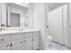 Clean, well-lit bathroom featuring white cabinetry and a shower/tub combo at 2433 Idlewood Way, Snellville, GA 30078