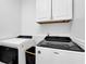 Bright laundry room with front loading washer and dryer at 2433 Idlewood Way, Snellville, GA 30078