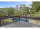 Backyard features a large in-ground pool and wooden deck at 3457 Skyview Dr, Lithia Springs, GA 30122