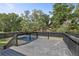 Wooden deck overlooking an inviting, in-ground pool and fenced yard at 3457 Skyview Dr, Lithia Springs, GA 30122