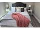 Cozy bedroom with a plush bed, soft lighting, and modern decor at 3457 Skyview Dr, Lithia Springs, GA 30122