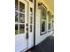 Close up of the front door with sidelights, windows and dark hardware at 3457 Skyview Dr, Lithia Springs, GA 30122