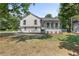 Charming two-story home with a covered front porch and well-maintained lawn at 3457 Skyview Dr, Lithia Springs, GA 30122