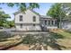 Charming two-story home with a covered front porch and well-maintained lawn at 3457 Skyview Dr, Lithia Springs, GA 30122