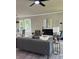 Inviting living room featuring an open layout, ample seating, and views of the dining area and kitchen at 3457 Skyview Dr, Lithia Springs, GA 30122