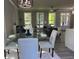 Bright, open-concept living space connecting the dining area, living room, and modern kitchen at 3457 Skyview Dr, Lithia Springs, GA 30122