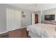 Bedroom with neutral walls, closet, and large window for natural light at 4965 Skyland Pkwy, Cumming, GA 30028