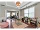 Bright living area featuring large windows, recessed lighting, and neutral wall paint at 4965 Skyland Pkwy, Cumming, GA 30028
