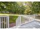 View from the front porch overlooking the lush yard at 879 Rock Oak Ln, Lawrenceville, GA 30046