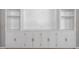 Close-up of the built-in white shelving unit with cabinets and shelving at 879 Rock Oak Ln, Lawrenceville, GA 30046