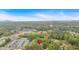 Overhead view of the property with surrounding trees and area map marker at 144 Cathy Ln, Hiram, GA 30141