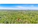 Aerial perspective of the wooded property with a location pin at 144 Cathy Ln, Hiram, GA 30141
