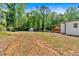 Expansive backyard, a shed, with ample space for outdoor activities at 144 Cathy Ln, Hiram, GA 30141