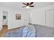 Neutral primary bedroom with a view into the en suite bathroom, and large closet at 144 Cathy Ln, Hiram, GA 30141