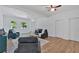 Spacious living room with neutral tones, wood flooring, and a comfortable seating area at 144 Cathy Ln, Hiram, GA 30141