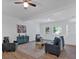Inviting living room features wood floors, recessed lights, and calming furniture at 144 Cathy Ln, Hiram, GA 30141