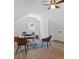 Bright office space with vaulted ceilings, modern furniture, and wood-look flooring at 144 Cathy Ln, Hiram, GA 30141