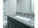 Bathroom vanity with granite countertop, toilet and bathtub at 247 Lotus Ln, Covington, GA 30016