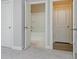 Bedroom area has several open doors leading to other rooms at 247 Lotus Ln, Covington, GA 30016