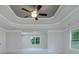 Spacious bedroom with ceiling fan and beautiful windows for natural light at 247 Lotus Ln, Covington, GA 30016