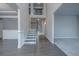 Inviting two story foyer with staircase and neutral color palette at 247 Lotus Ln, Covington, GA 30016