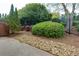 Landscaped backyard features a variety of plants and foliage, offering a serene outdoor space at 2700 Ridge Run Tr Trl, Duluth, GA 30097