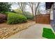 Backyard features a stone pathway, a fence, and a grassy area, offering outdoor enjoyment at 2700 Ridge Run Tr Trl, Duluth, GA 30097